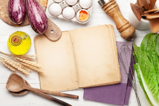 Assorted cooking tools and recipe book
